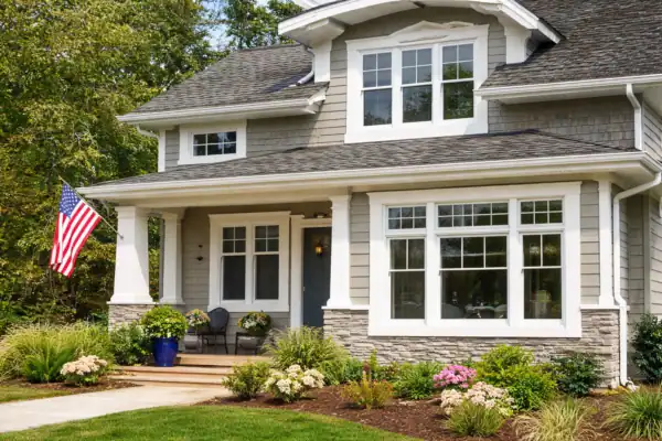 Double hung replacement windows installed on residential home exterior